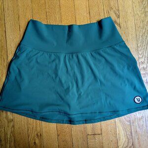 Vuori volley skirt for tennis or pickleball in soft green, size Medium